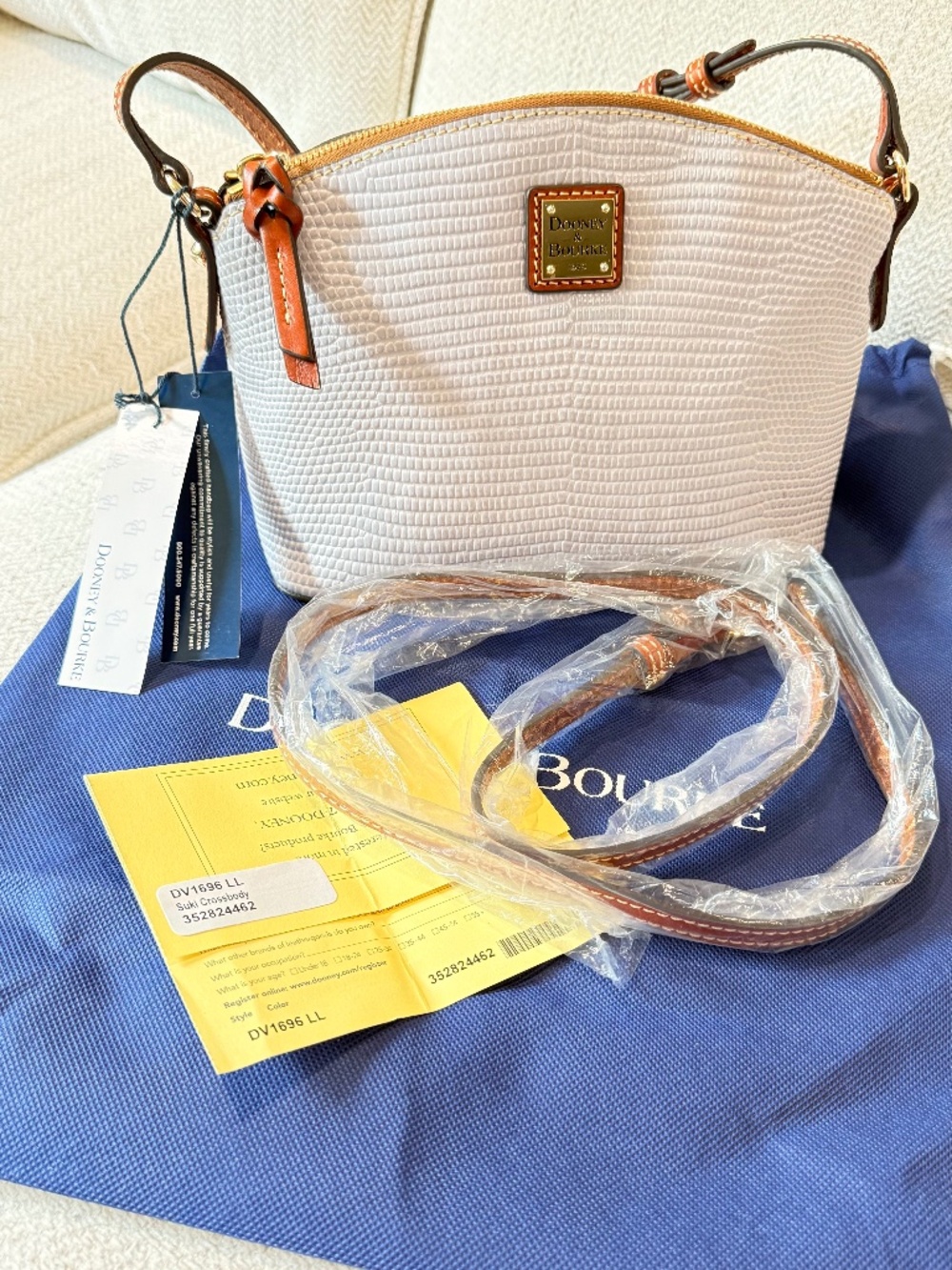 Dooney & Bourke Lilac Suki Leather Crossbody Bag.
